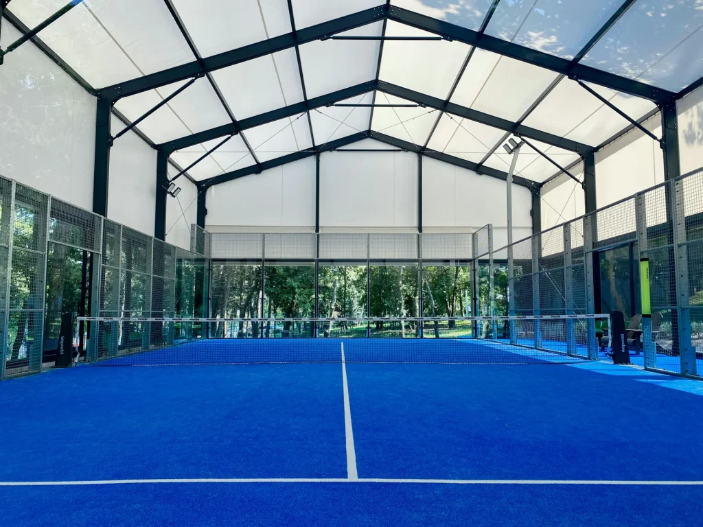 Padel Court Photo by Ercan Evcimen: https://www.pexels.com/photo/indoor-padel-court-with-blue-surface-32474981/